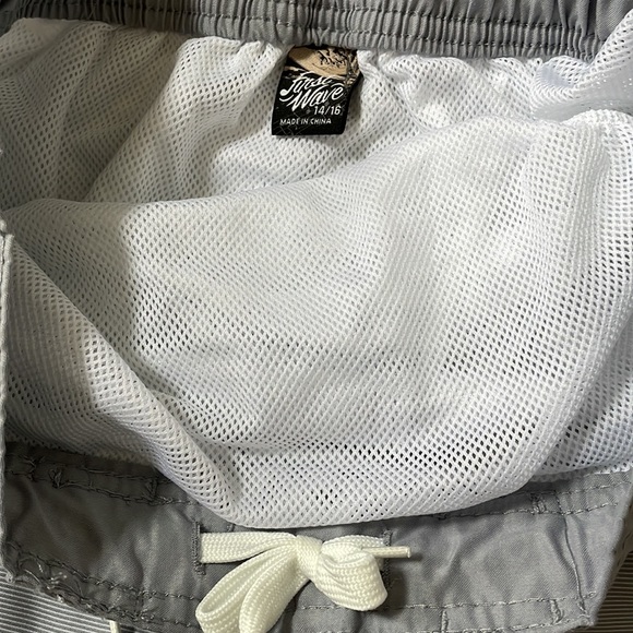 Swim trunks w/faux drawstring and inner drawstring to keep shorts in place. EUC - Picture 2 of 3